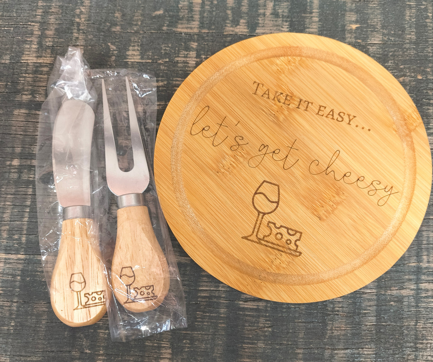 cheese board with utensils